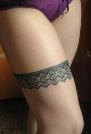 http://www.checkoutmyink.com/tattoos/foolishginger/tattoo